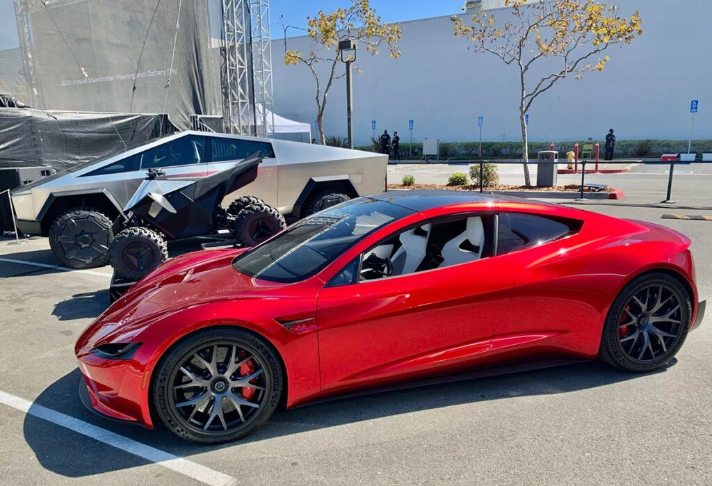 The Next-gen Tesla Roadster prototype at the Battery Day event. Cyber ATV and the Cybertruck can be seen in the background.