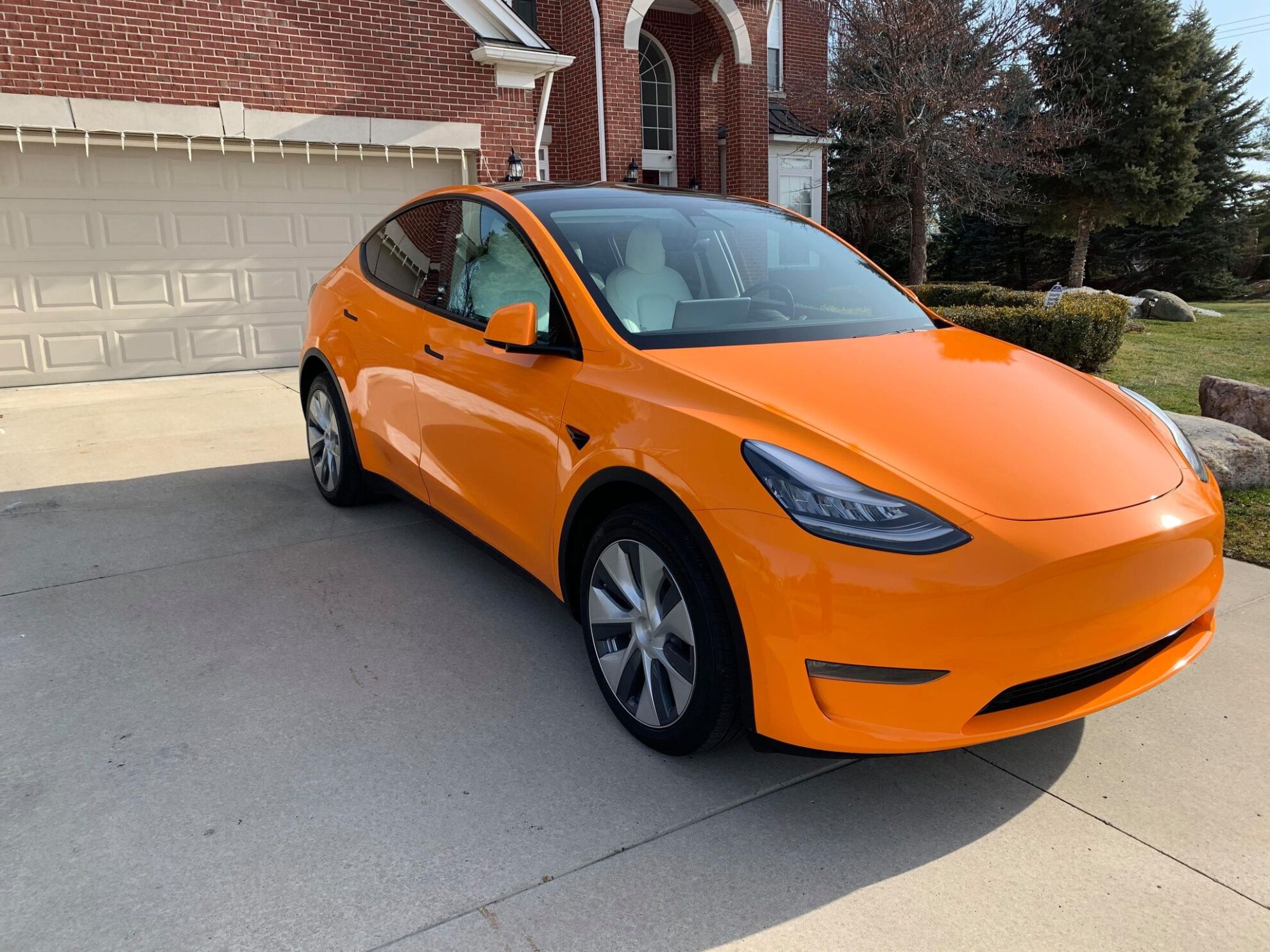 This orangewrapped Tesla Model Y is a sure headturner (gallery