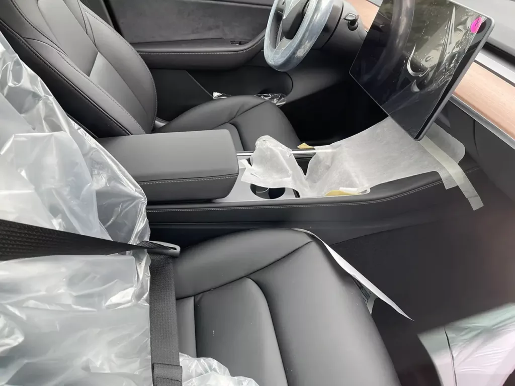 New design refresh Tesla Model Y center console spotted. 