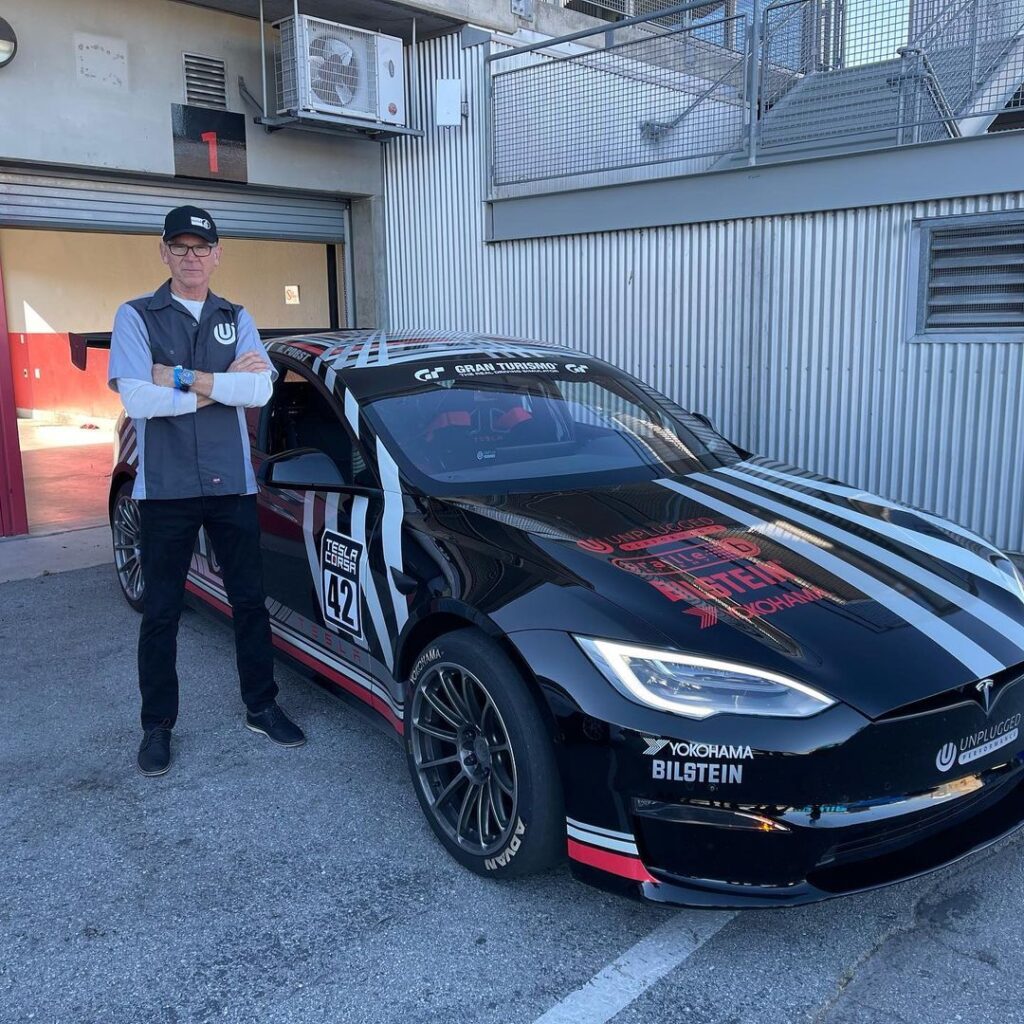 Randy Pobst with his Pikes Peak ride, the Unplugged Performance Tesla Model S Plaid.