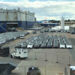 Port of Oslo (Oslo Havn) with hundreds of Tesla Model Y cars unloaded from Glovis Supreme car transport vessel.