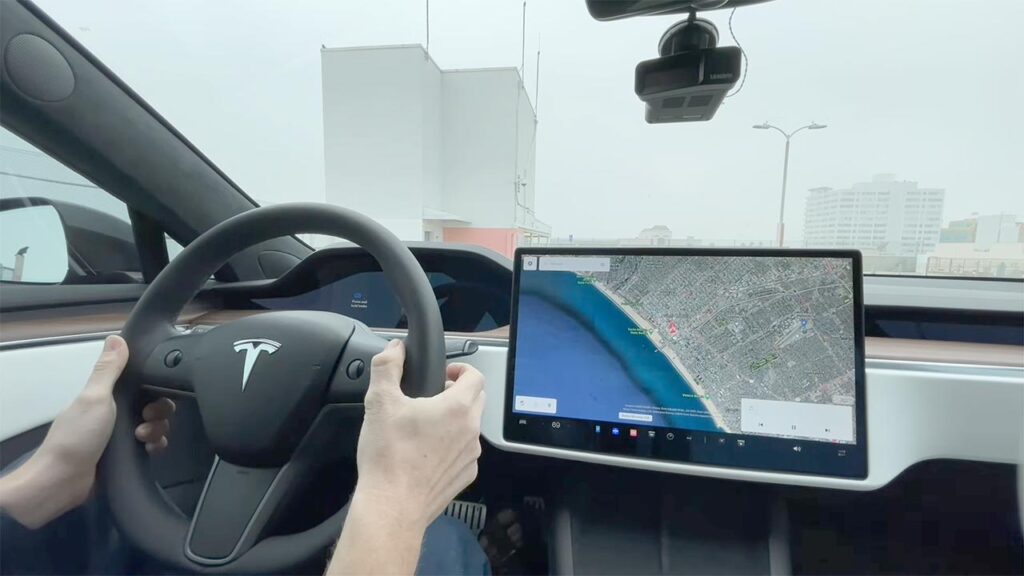 2021 Tesla Model S with the traditional Model 3 round steering wheel retrofit.