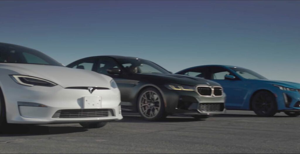 Tesla Model S Plaid, BMW M5 CS, and Cadillac CT5-V Blackwing at the dragstrip start line.