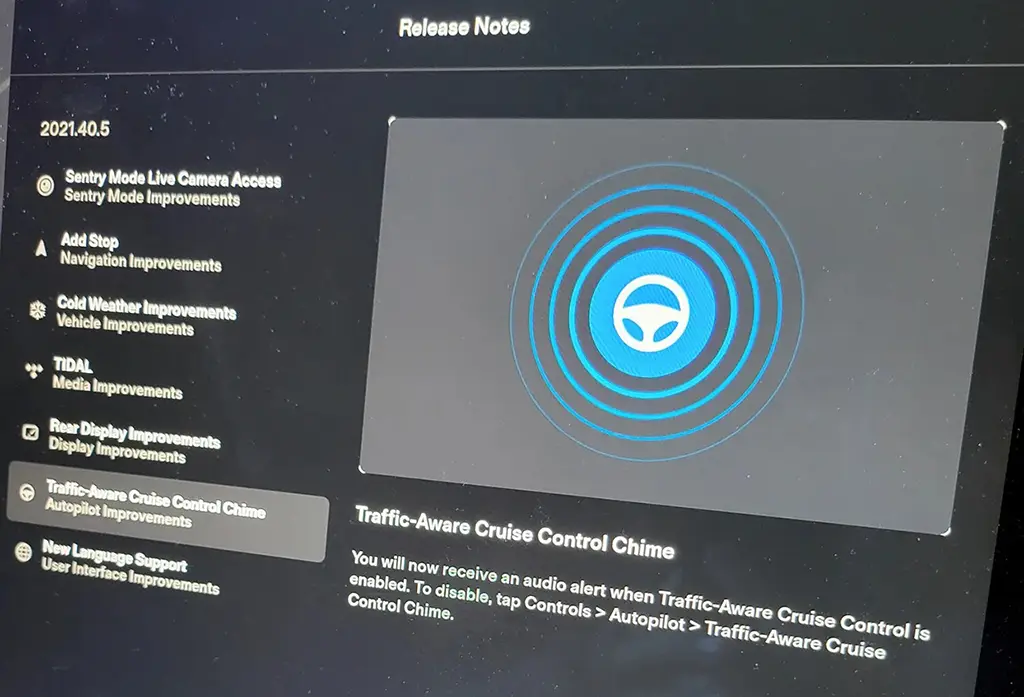 Traffic-Aware Cruise Control Chime feature explained in the Tesla software version 2021.40.5 release notes.