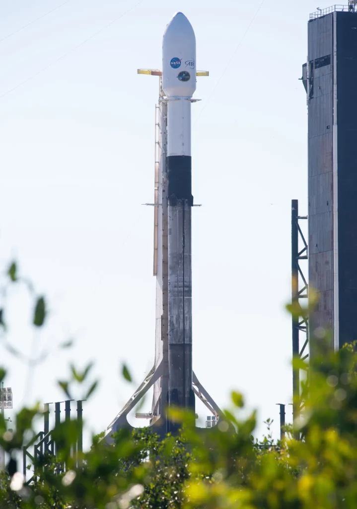 A SpaceX Falcon 9 rocket carrying NASA’s Imaging X-ray Polarimetry Explorer (IXPE) spacecraft is seen on the launch pad at Launch Complex 39A, Wednesday, Dec. 8, 2021, at NASA’s Kennedy Space Center in Florida.