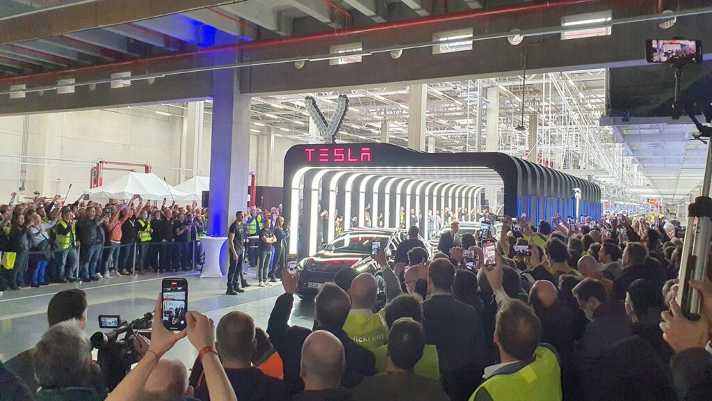 The moment when Tesla delivers first Giga Berlin-made Model Y electric SUVs to its customers, Elon Musk also joins the event.