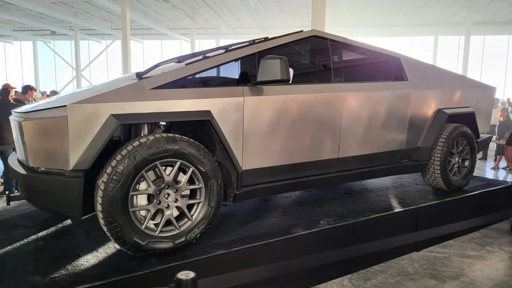 Side view of the Tesla Cybertruck on display at Giga Texas Cyber Rodeo. Notice that there are no door handles on the present. Credit: Dirty Tesla / Twitter.