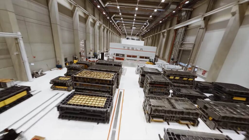 Drone camera view of the inside of Tesla Giga Berlin's Model Y manufacturing factory.