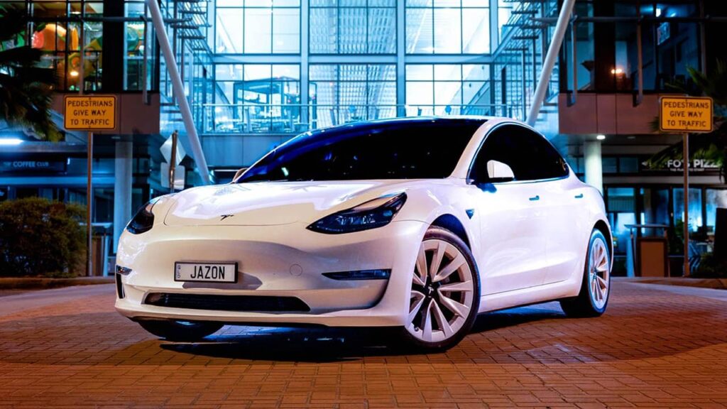 A white Tesla Model 3 from Australia.