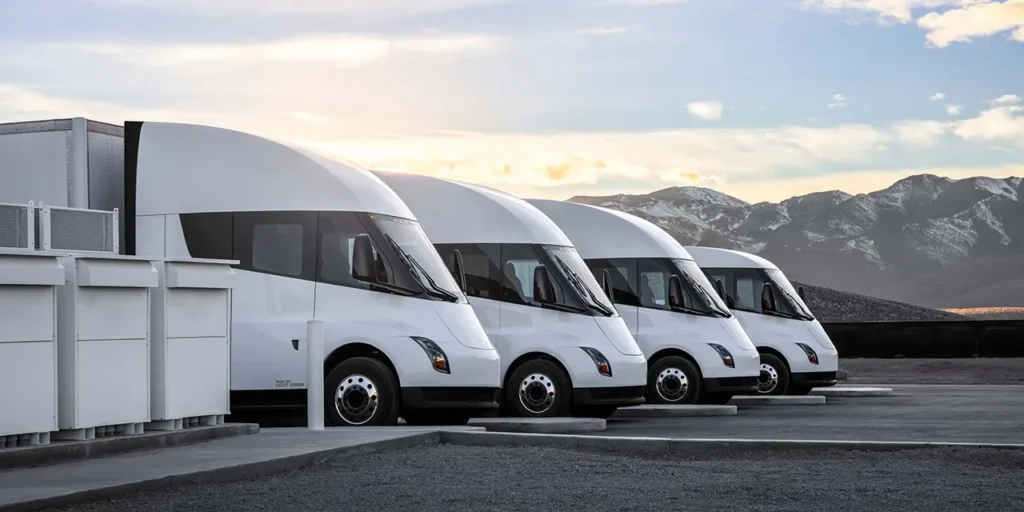 4 Tesla Semi-trucks parked at the Giga Nevada Megacharger station.