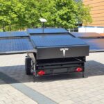 SpaceX Starlink square dish terminal (Dishy McFlatFace) installed on a solar trailer made by Tesla displayed at IdeenExpo 2022 in Hanover, Germany.