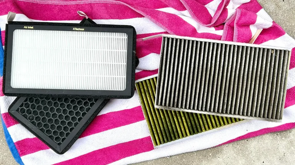 New and clean aftermarket Tesla Model Y / Model 3 air filter (left) and dirty, clogged, and old filters causing the bad odor (right).