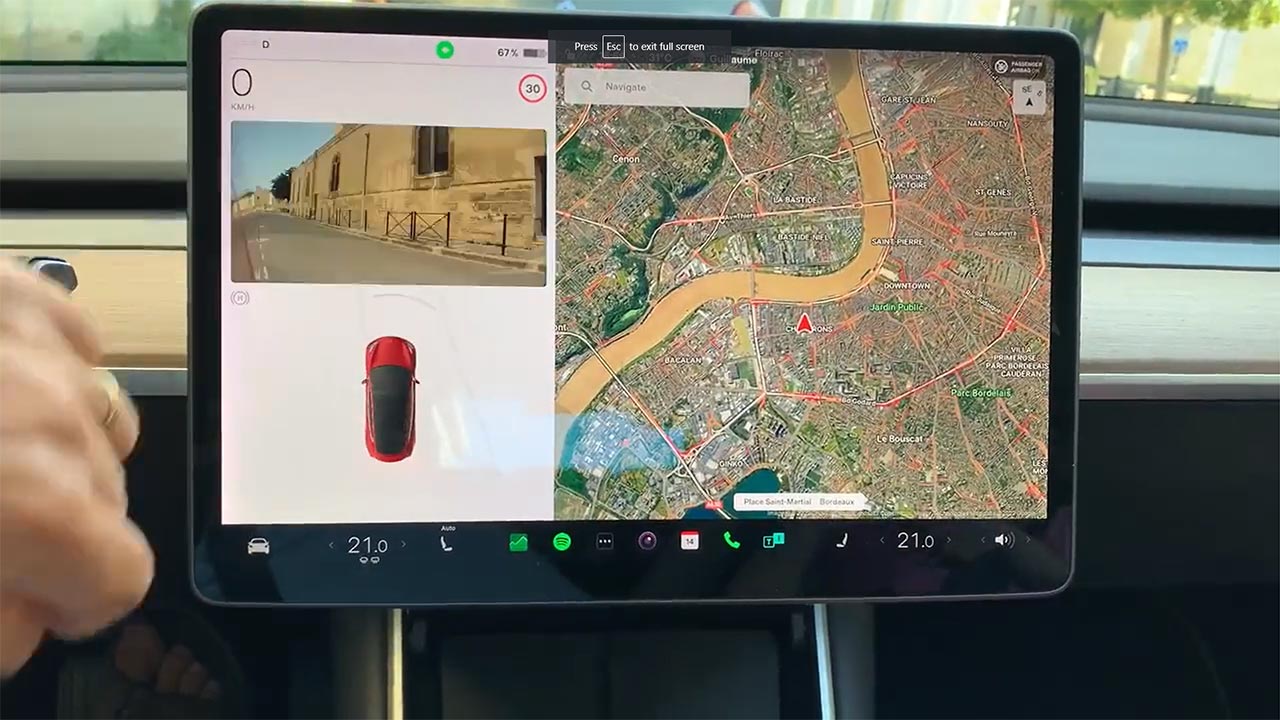 You can turn on the blind spot camera feed by tapping the turn signal