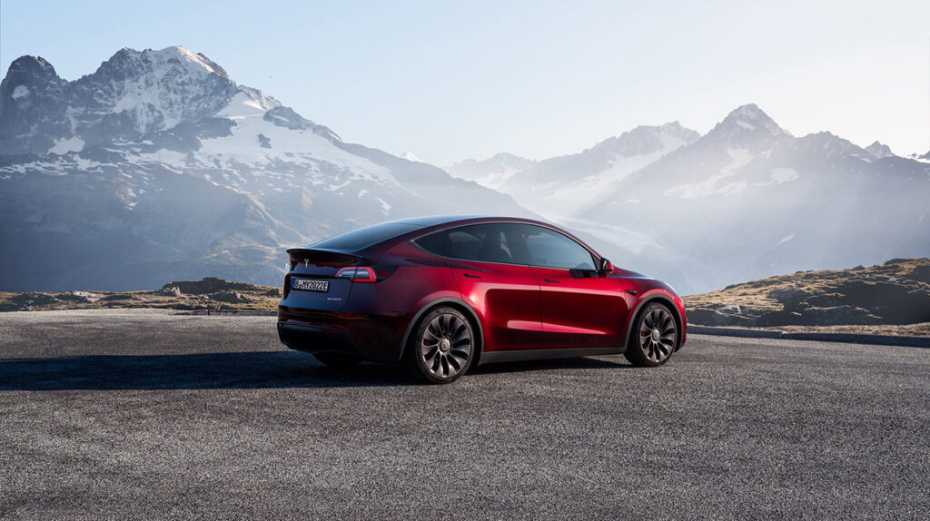 Tesla Model Y in Midnight Cherry Red color. A paint option from Tesla's advanced Giga Berlin paint shop.