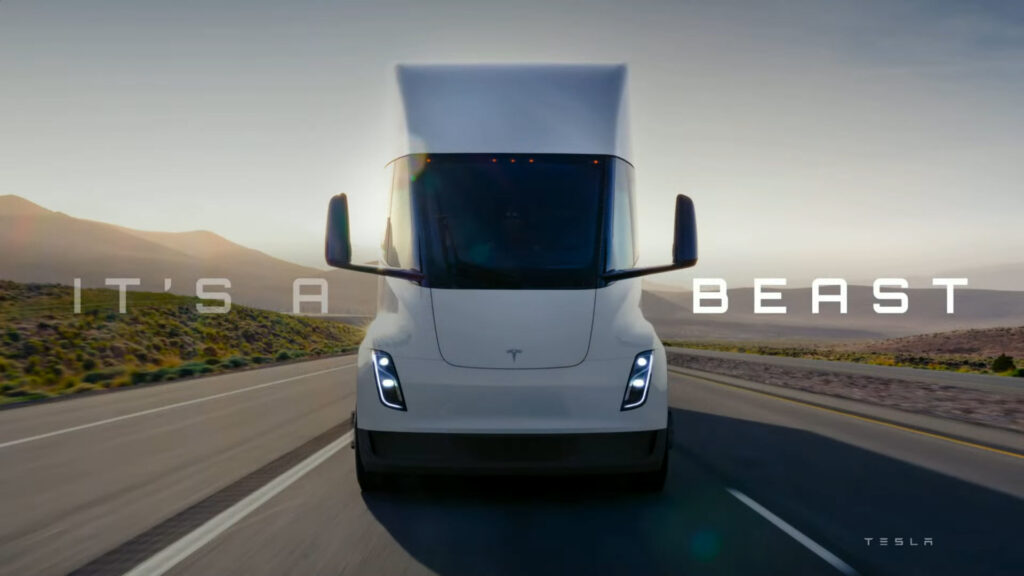 Tesla Semi truck with "It's a A Beast" caption on the delivery day presentation slide.