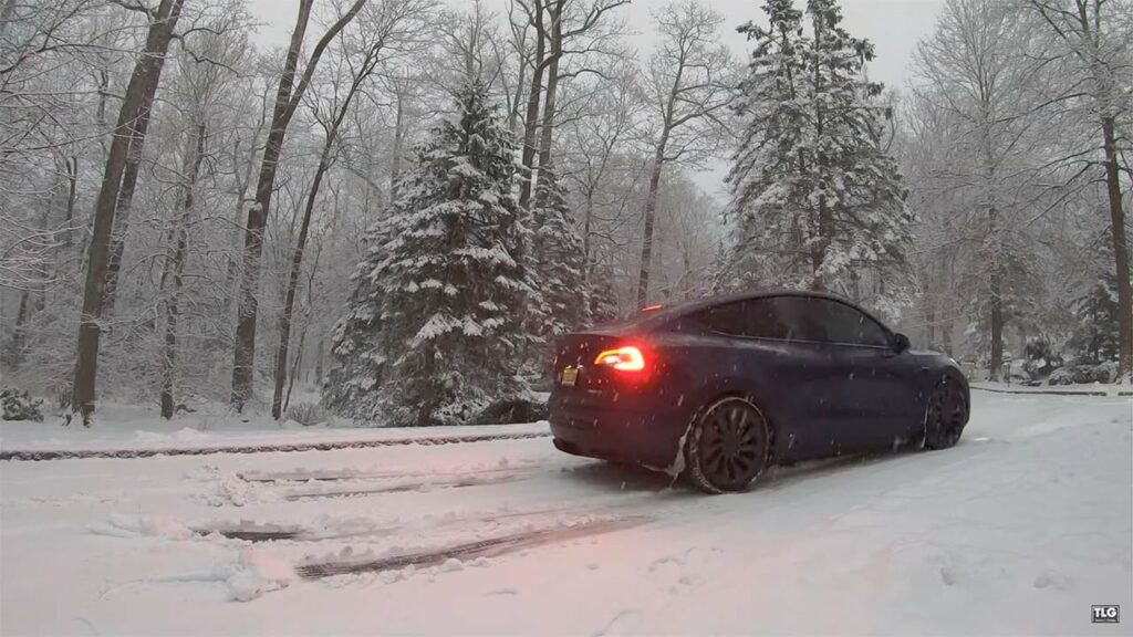 Tesla Model Y Performance AWD traction tested in snow with all-season tires and Off-Road Assist mode.