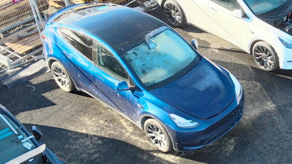 A Tesla Model Y in Deep Blue Metallic color spotted being parked outside Gigafactory Berlin.