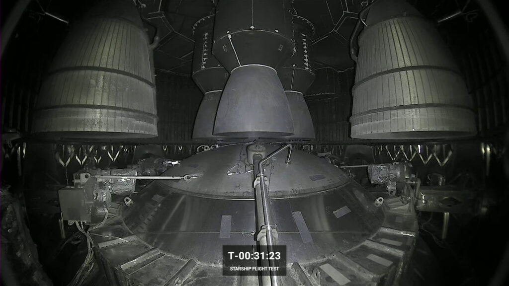 A look from the internal camera of the aft section of the 2nd stage Starship showing sea-level Raptor engines (center) and vacuum-level engines (sides) from the Starship launch attempt on Monday 17th April 2023.