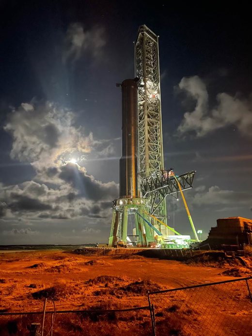 Elon Musk's imagination of a Starship launch and landing tower set up on Mars one day.
