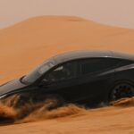 A Tesla Model Y getting tested for extreme hot weather in a UAE desert (Dubai).