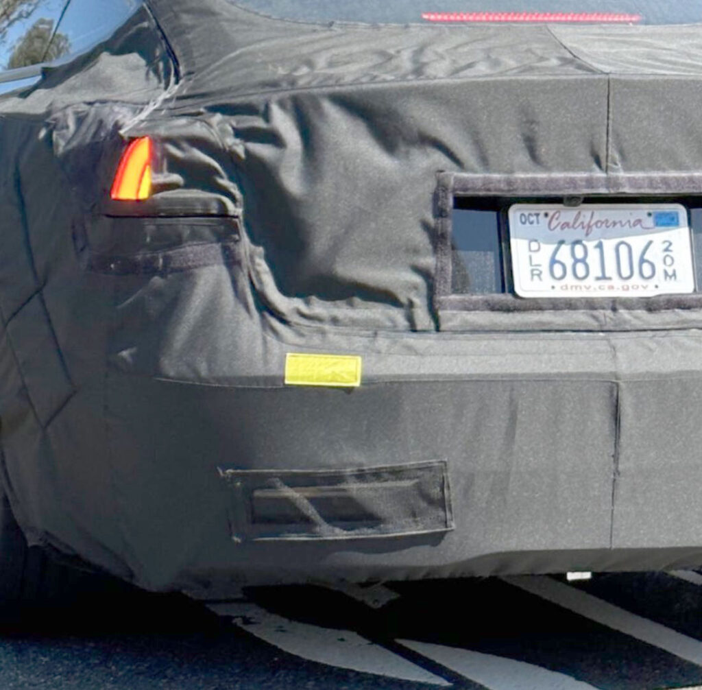 Project Highland Tesla Model 3 refresh spotted with a part of the rear brake light exposed during testing.