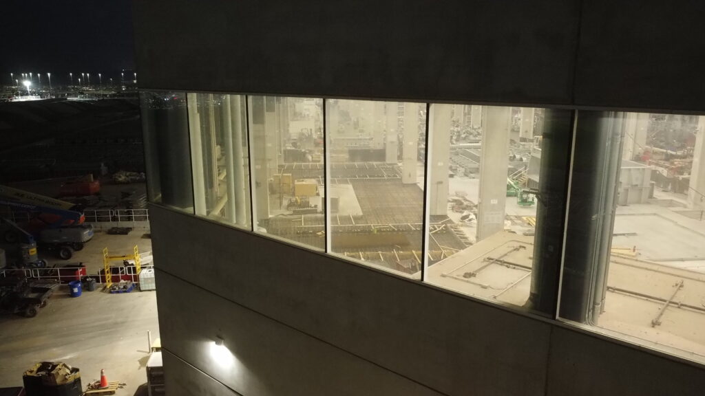 The 3rd foundation of the 9,000-ton Tesla Cybertruck Giga Casting machine can be seen through the windows of the Giga Texas Cybertruck casting area.