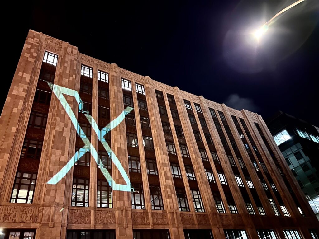 "Lights. Camera. X!," Twitter CEO Linda Yaccarino tweets the picture of the Twitter HQ with the new 'X' logo project on the building.