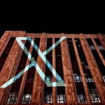 Twitter X logo projected on the Twitter HQ building as this version gets selected by Elon Musk.