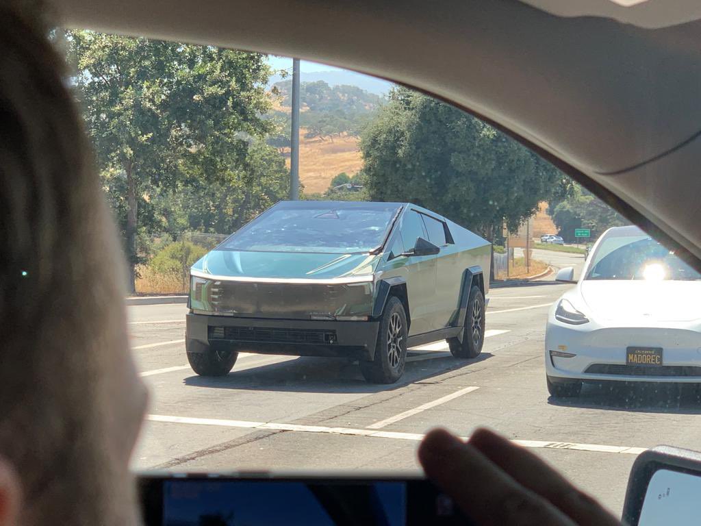 Tesla Cybertruck with Toyota Tundra wrap in green color spotted in California (wheels resemble a stock Toyota Tundra).