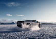 Tesla Cybertruck accelerating on icy terrain.