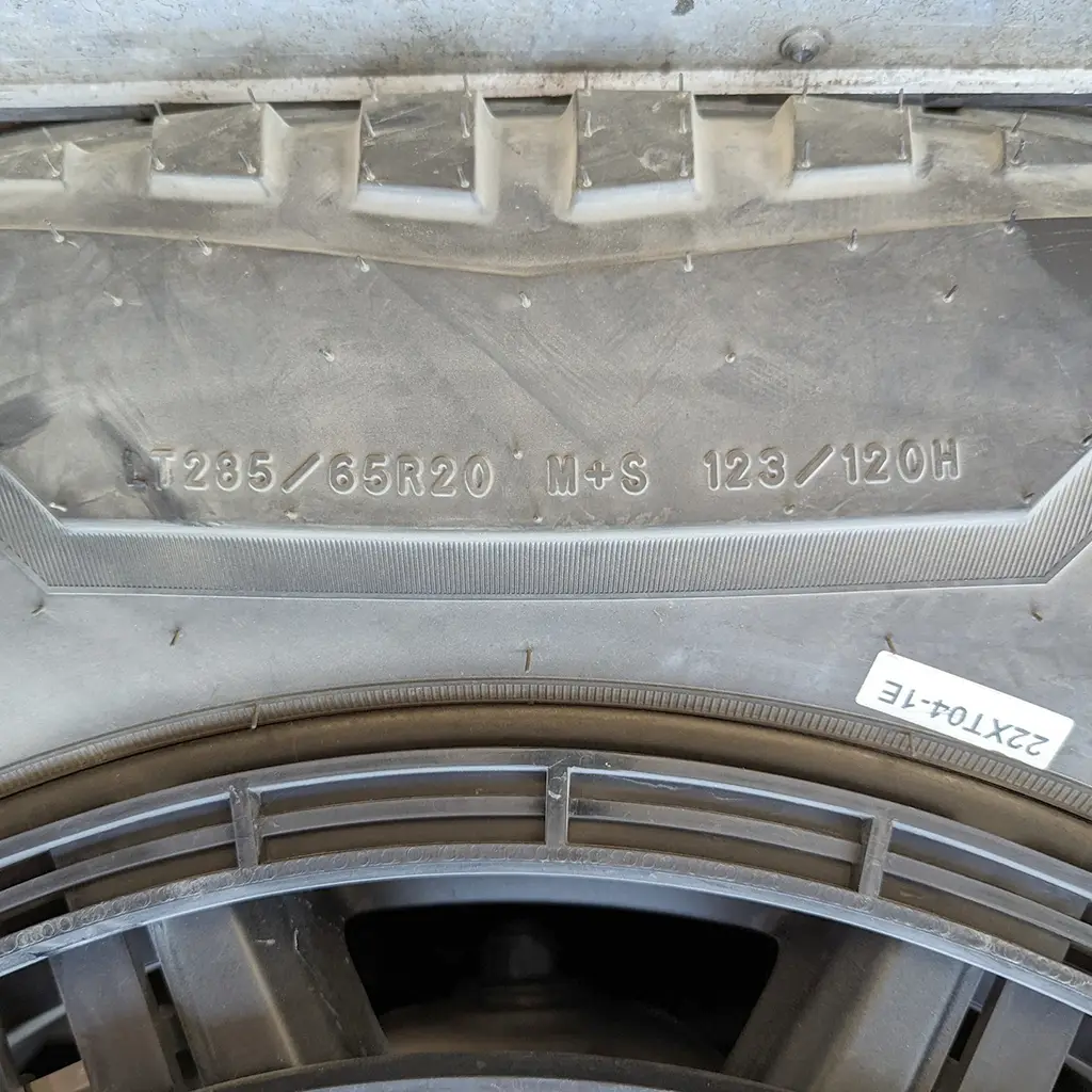 The tire size reading on the Tesla Cybertruck release candidate spotted on an enclosed trailer in Austin, Texas.