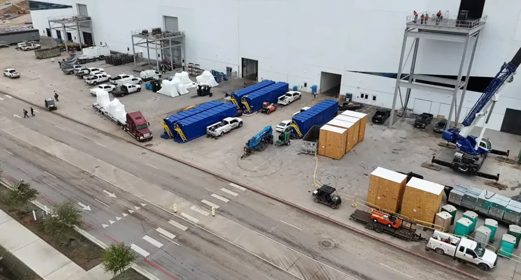 Large crates most probably containing machinery or other equipment arrive at Giga Texas on Friday 15th Sep 2023. These boxes were delivered inside the 4680-cell production building.