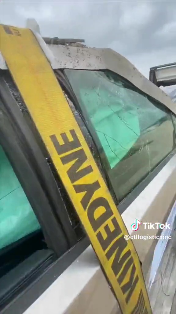 Condition of the Cybertruck's passenger-side front window glass after the ditch rollover test.