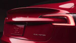 Back profile and the new rear combination lamps of the design-refreshed 2024 Tesla Model 3 Highland in ultra red color.