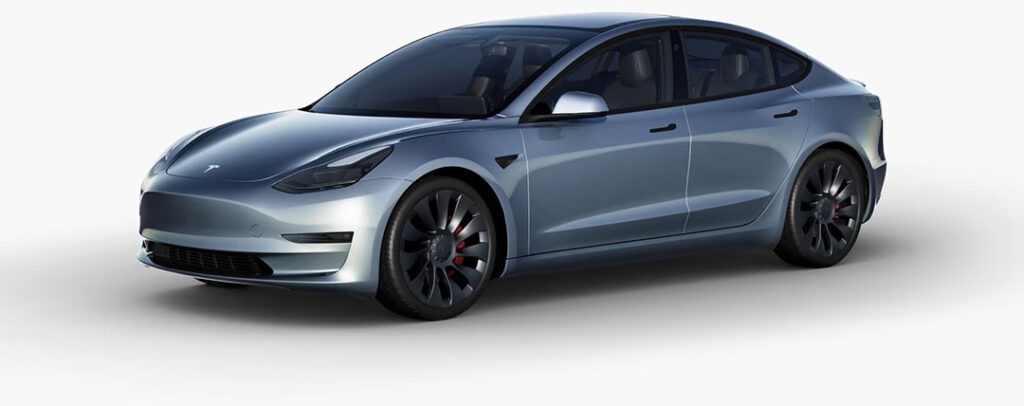 A Tesla Model 3 wrapped in Glacier Blue color.