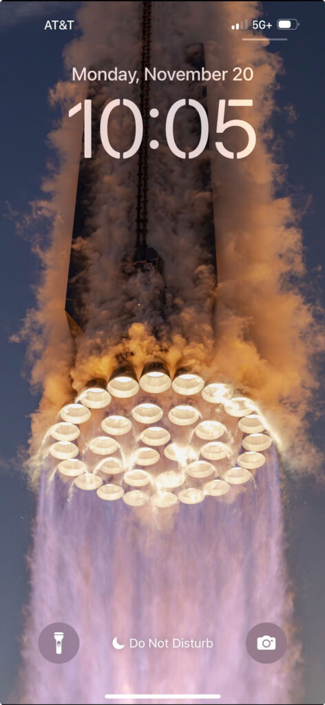 Starship as it lifts off the launch pad during its 2nd orbital flight test. Elon Musk says that this is his favorite wallpaper on his iPhone.
