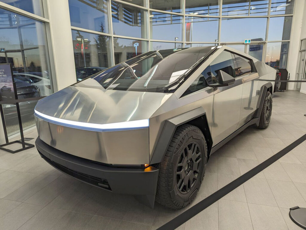 Lone Tesla Cybertruck on display at the Tesla Sales and Service Centre located at 19505 Langley Bypass, Surrey, BC V3S 6K1, Canada.