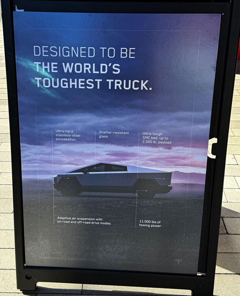 A banner at the Tesla San Diego-UTC mall showroom confirms the basic specs of the Cybertruck.