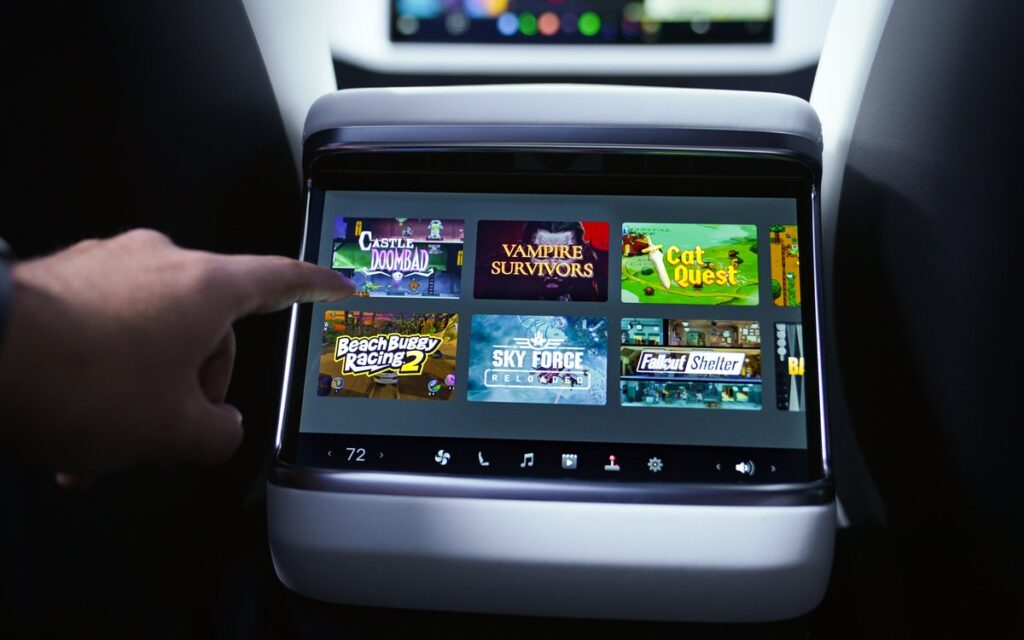 Rear screen of a Tesla vehicle with playable video games for rear passengers. Feature added in the 2023 Tesla Holiday Software Update.