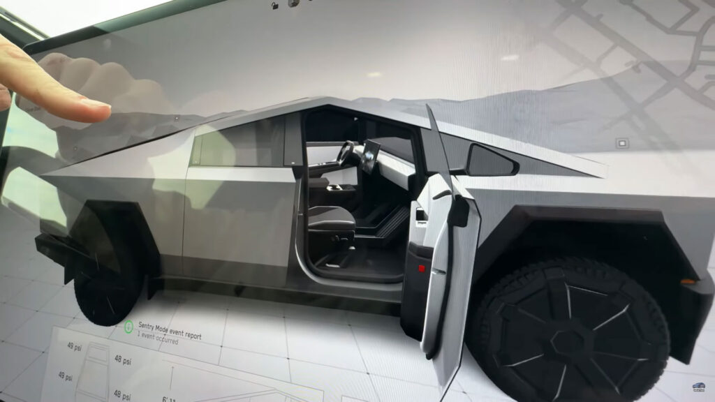 Tesla Cybertruck 3D visualization shows the detailed matching interior of the pickup truck on the center touchscreen display.