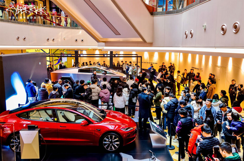 Crowds of people gather at the Tesla Store in Shanghai, China to take a glimpse of the Cybertruck.