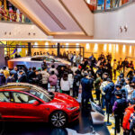 Crowds of people gather at the Tesla Store in Shanghai, China to take a glimpse of the Cybertruck.