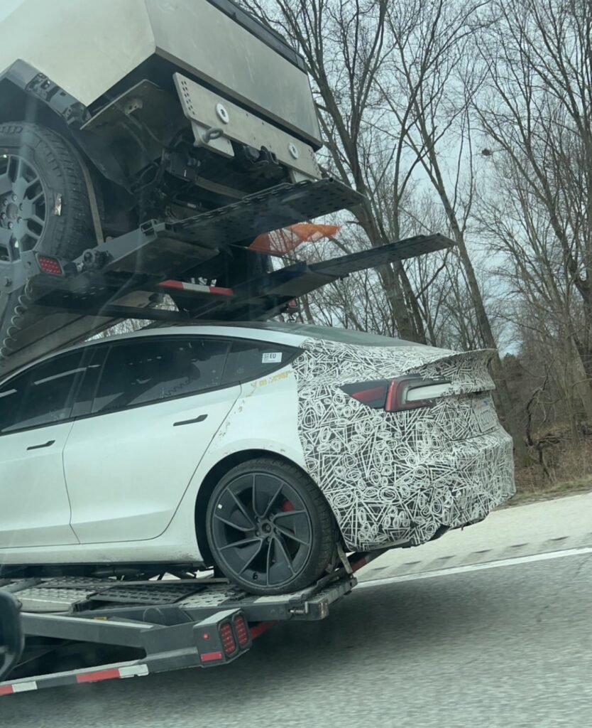 A Tesla Model 3 Highland Ludicrous variant spotted on a car transport carrier trailer along with the Cybertrucks.