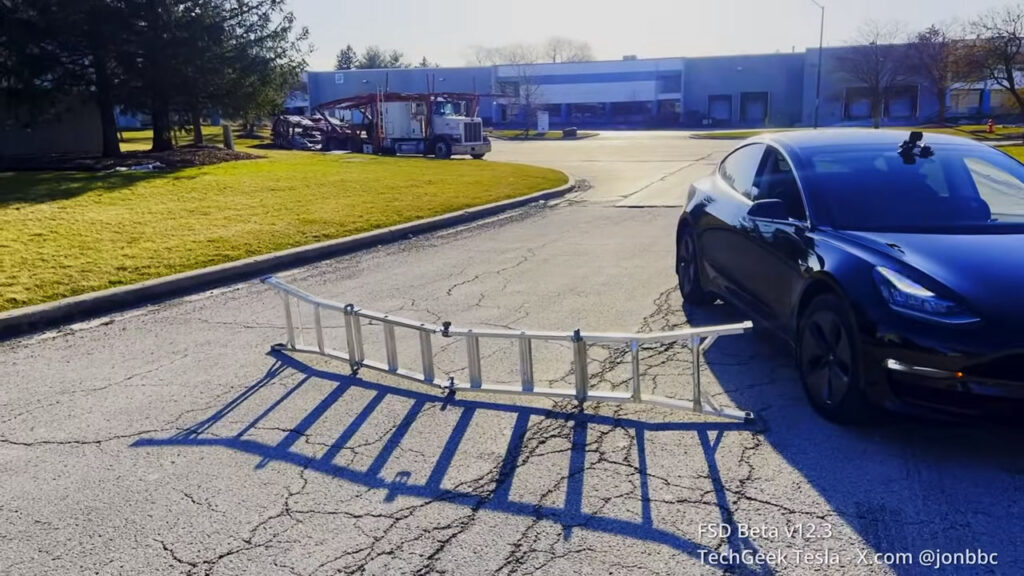 Tesla FSD v12.3.1 tested for a fixed road obstructing using an aluminum ladder.