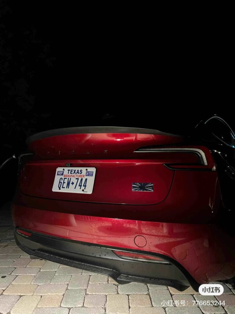  Ultra Red Tesla Model 3 Ludicrous spotted with a Texas Manufacturer's license plate.