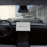 A Tesla Model Y self-delivering itself from the Giga Berlin production line to the outbound shipping lot. A Cybertruck support vehicle spotted outside Tesla's Gigafactory in Berlin-Brandenburg, Germany.