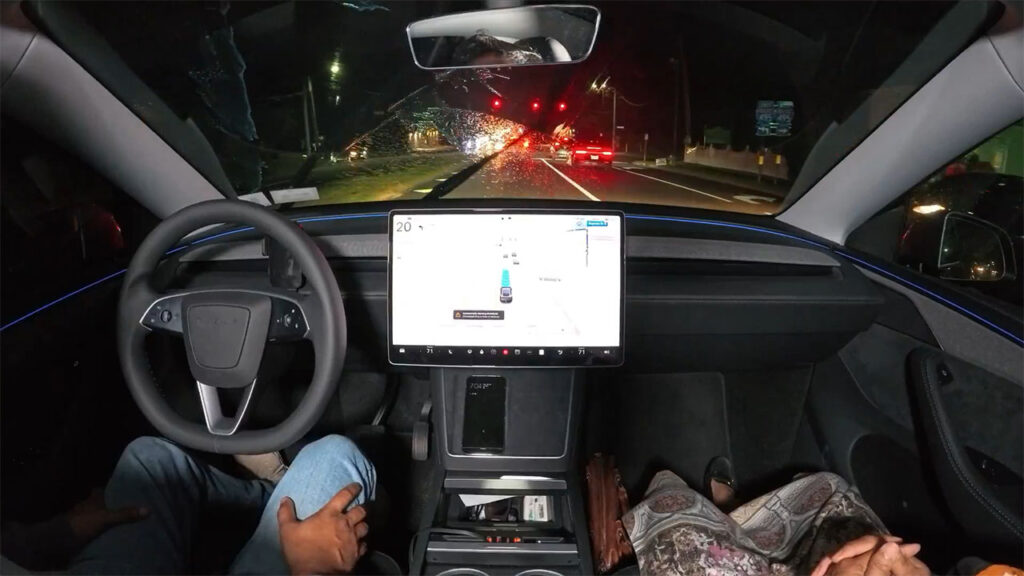 Tesla FSD v14 adds the new windshield wiper function that focuses on cleaning the front narrow field camera.