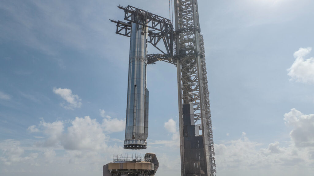 Super Heavy Booster 15-2 lifted on the OLM Pad 1 at Starbase ahead of the Flight 11 launch test (IFT-11).