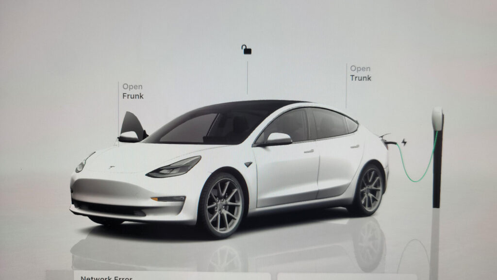 Tesla on-screen visualization showing a connected Wall / Destination Charger (requires Tesla OTA update 2025.38 or later).