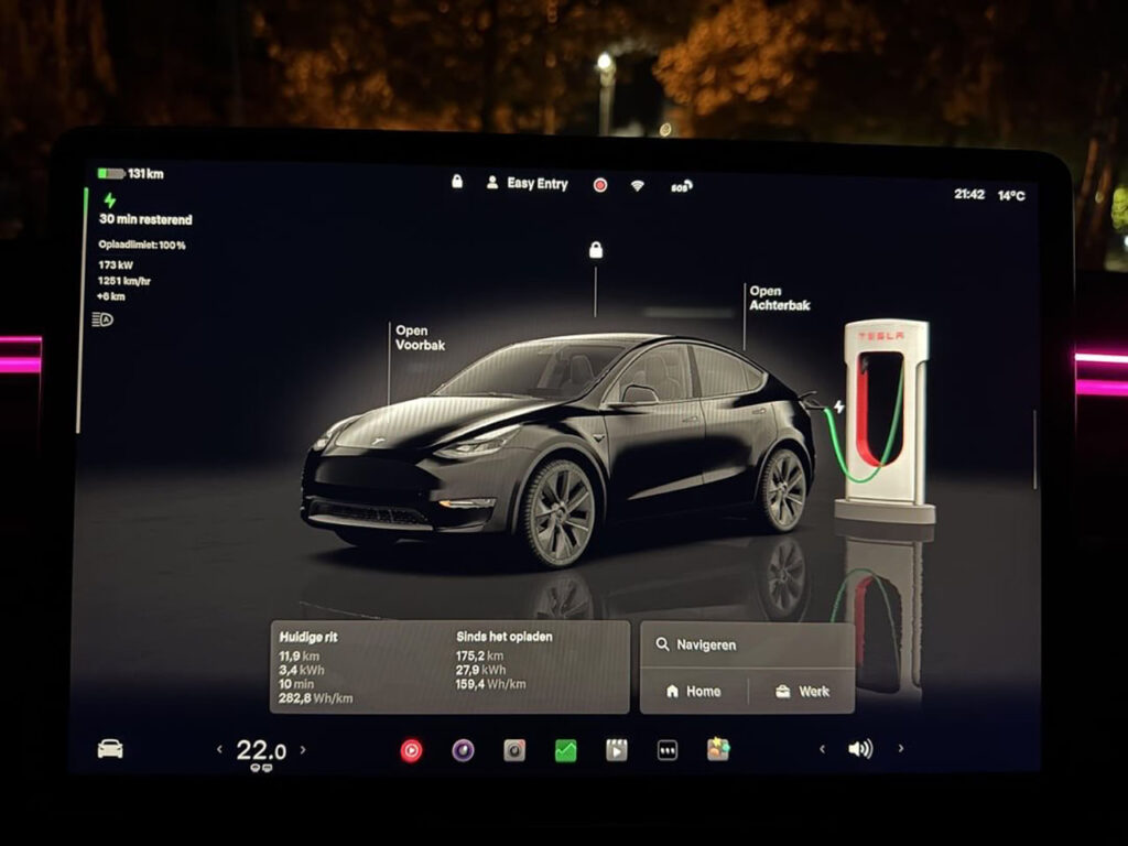 Tesla Model Y screen visualization displaying the car charging at a Supercharger (requires Tesla OTA update 2025.38 or later).